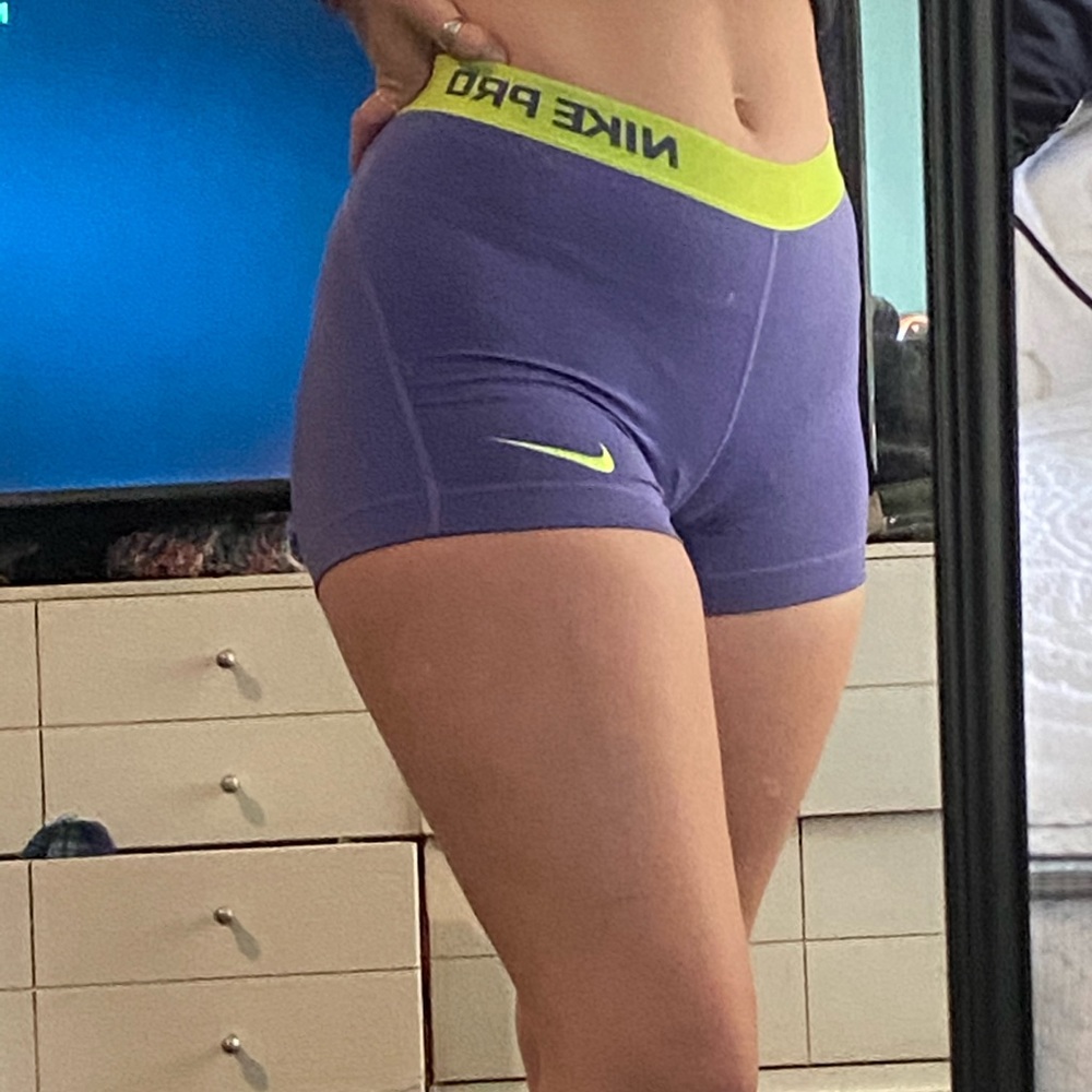 Purple Nike Pros with Neon Yellow Band